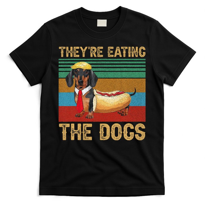 tet1698984-theyre-eating-the-dogs-2024-retro-funny-dachshund-weiner-gift--black-at-front
